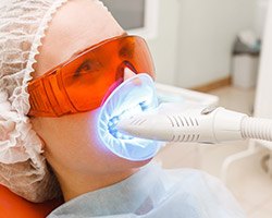 Patient receiving zoom teeth whitening treatment