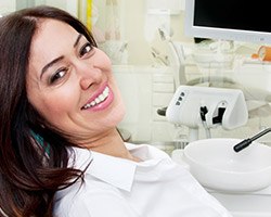 Smiling woman in dental chair