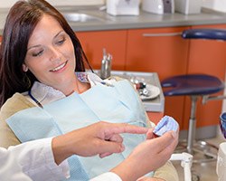 Dentist explaining tooth-colored fillings to his patient