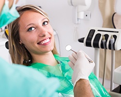 Smiling woman in dental chair