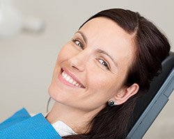 Smiling woman in dental chair