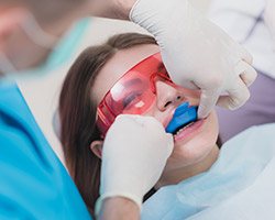 Patient receiving fluoride treatment