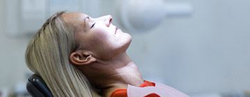 Relaxed woman in dental chair