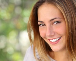 woman smiling outside