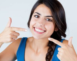 woman pointing smiling