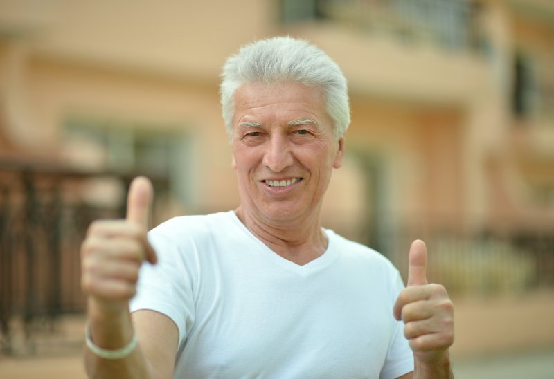 older man smiling with nice teeth