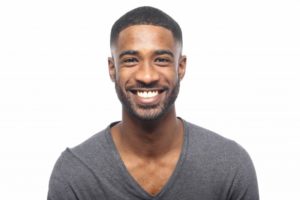 man smiling with healthy teeth